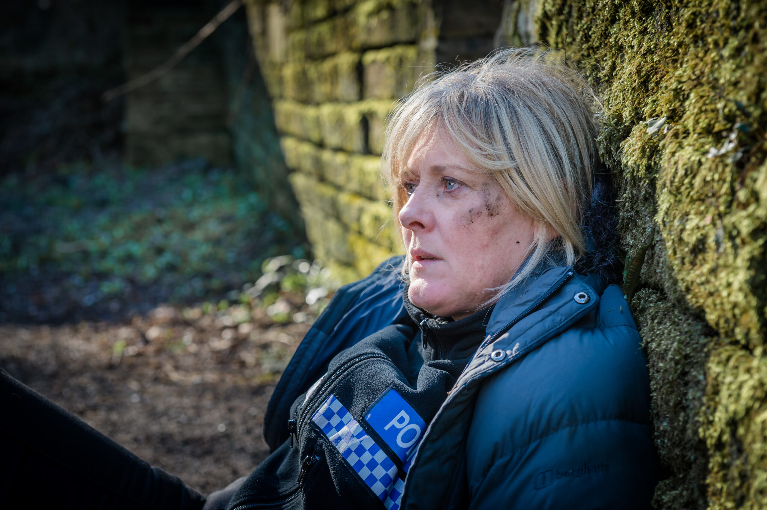 Sarah Lancashire laying down on the floor in Happy Valley