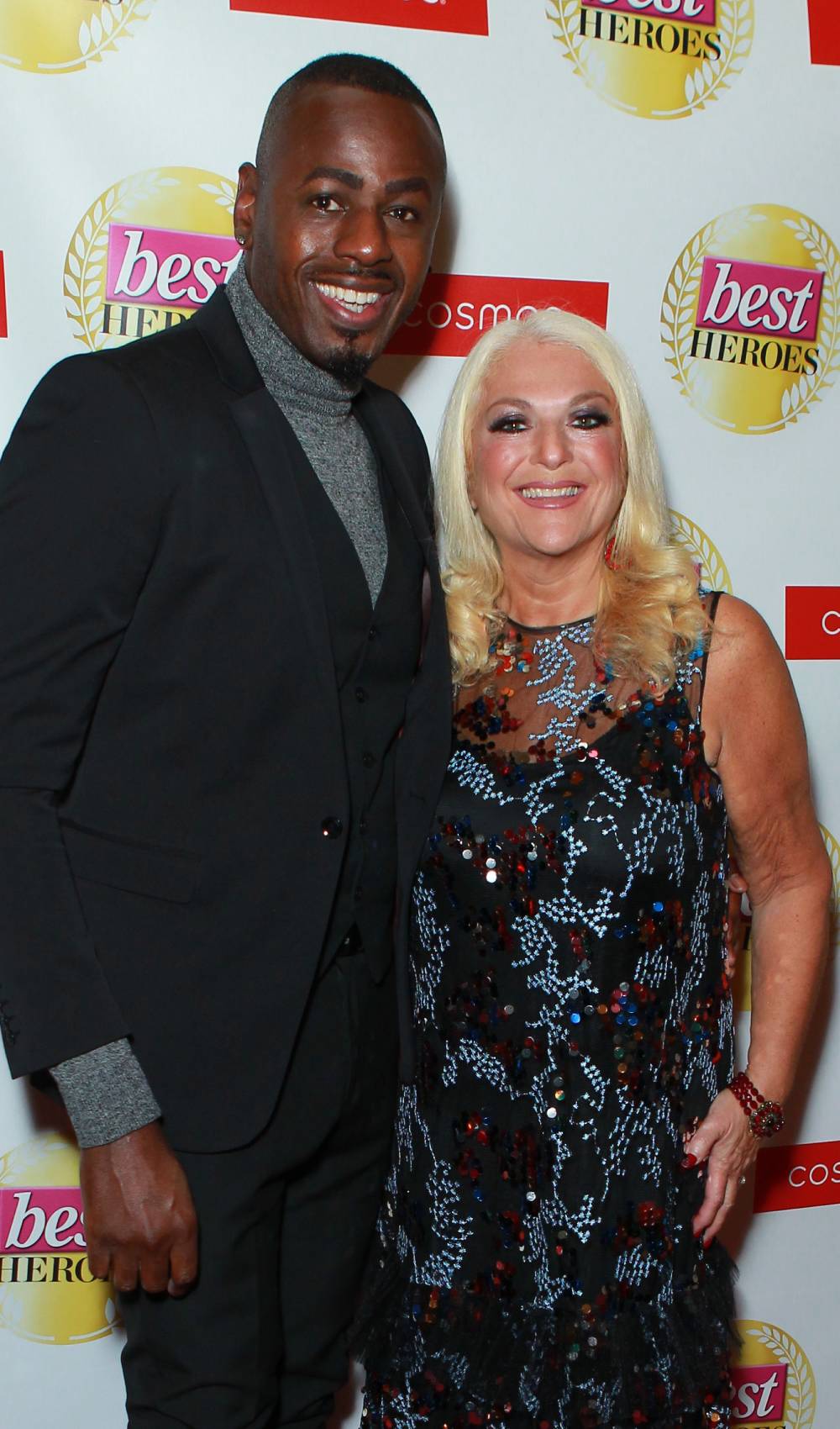 Vanessa Feltz and partner Ben Ofoedu smiling at event