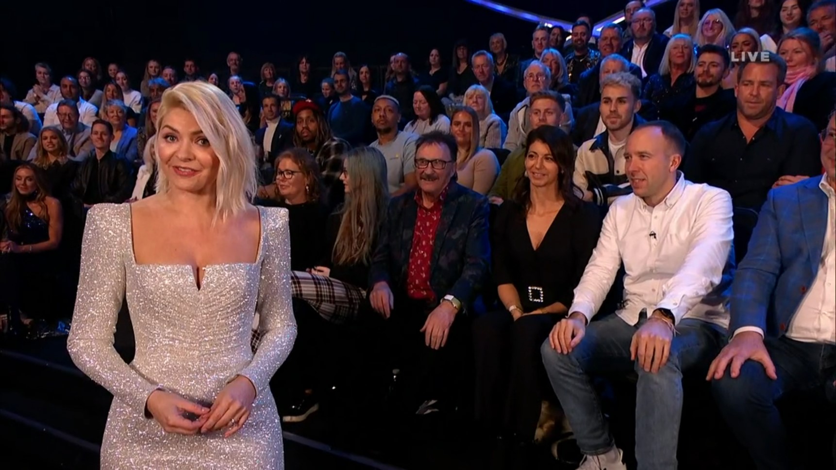 Holly Willoughby hosting Dancing On Ice as Matt Hancock sits in audience