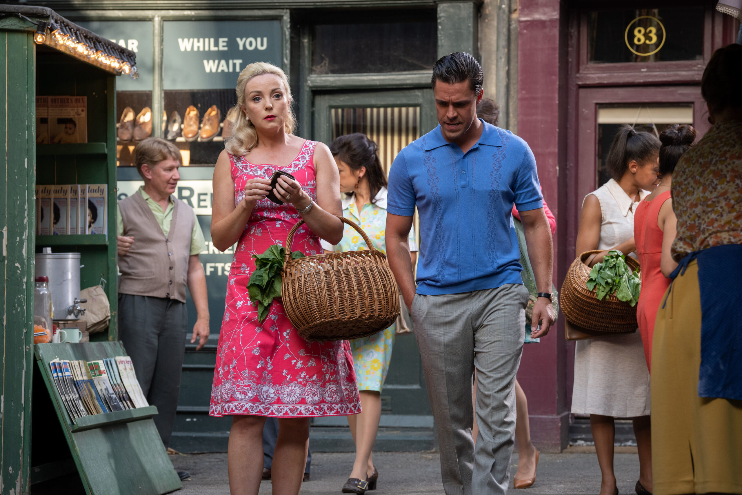 Trixie and Matthew walk down the street together