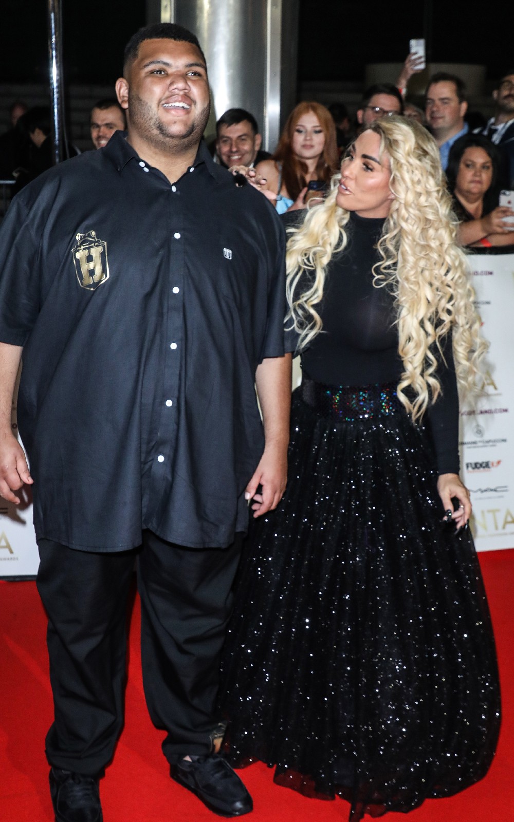 Katie Price and son Harvey smiling at NTAs