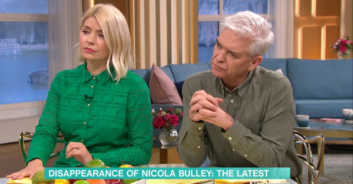 Holly Willoughby listening as Phillip Schofield looks thoughtful on This Morning today 