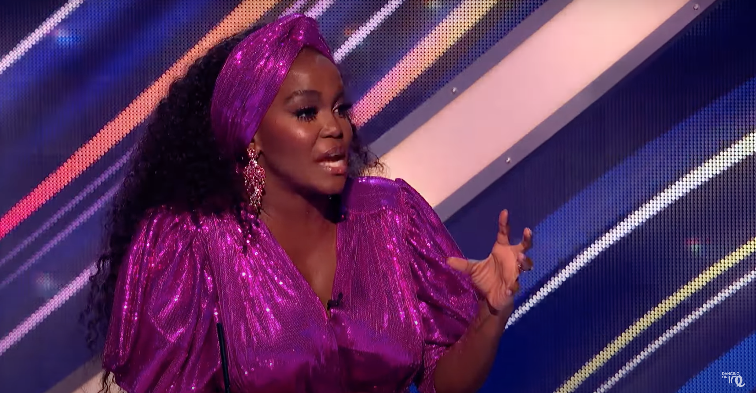 Oti Mabuse wearing a purple dress on Dancing On Ice
