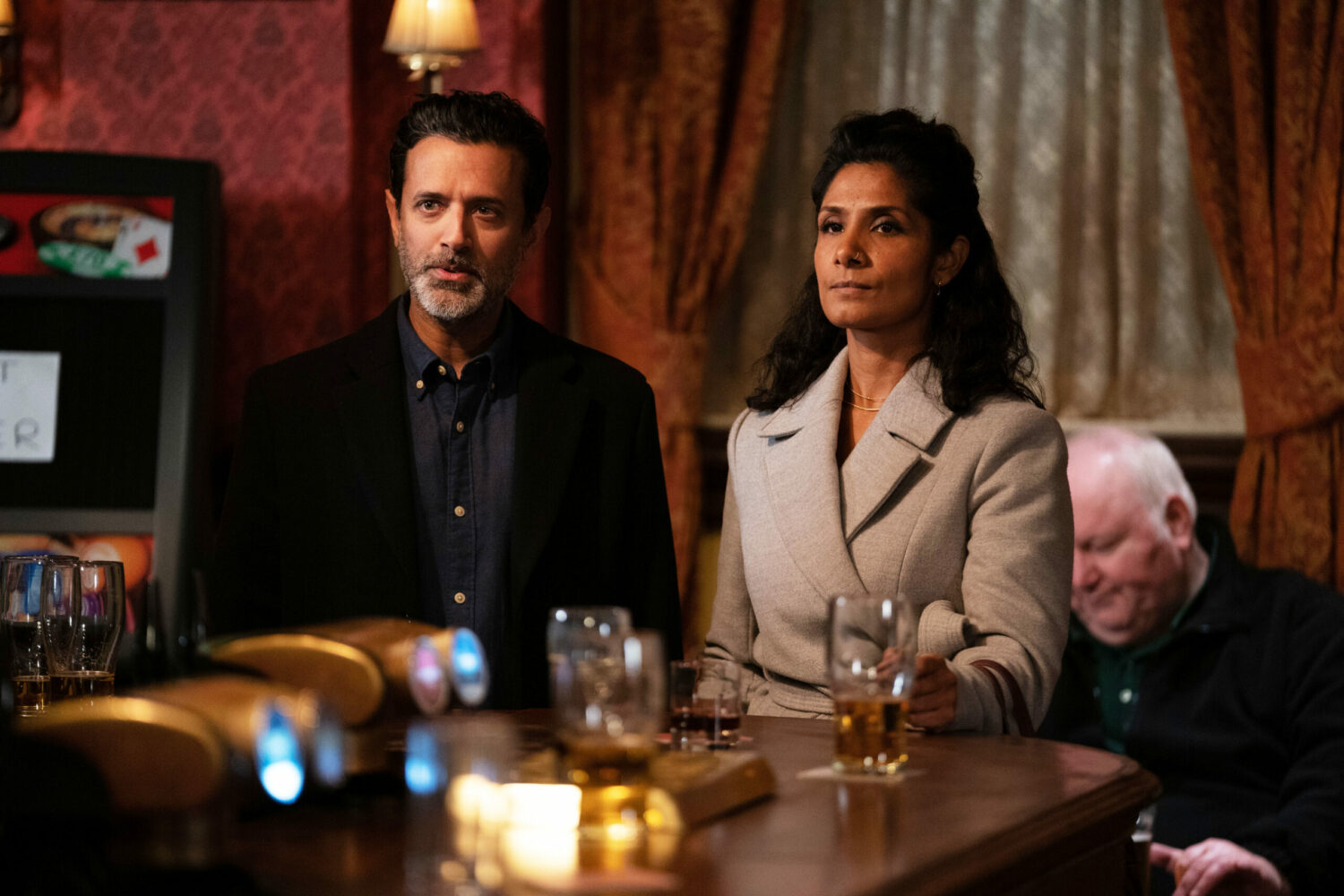 Nish and Suki looking cold and awkward together on EastEnders