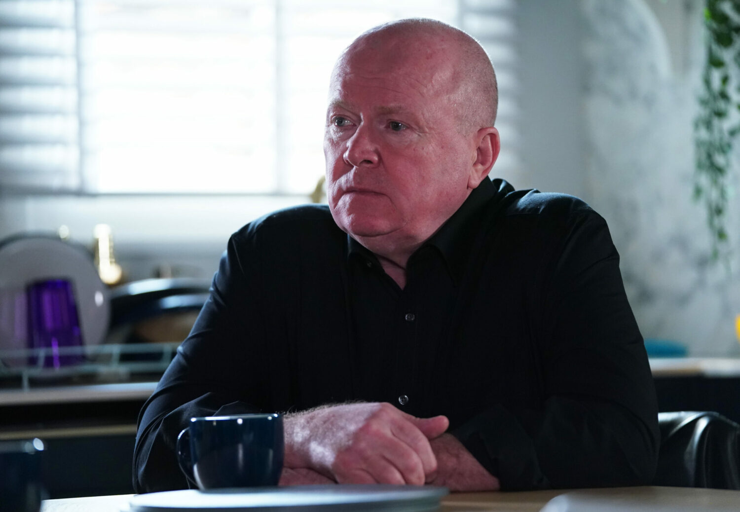 Phil looking moody on EastEnders