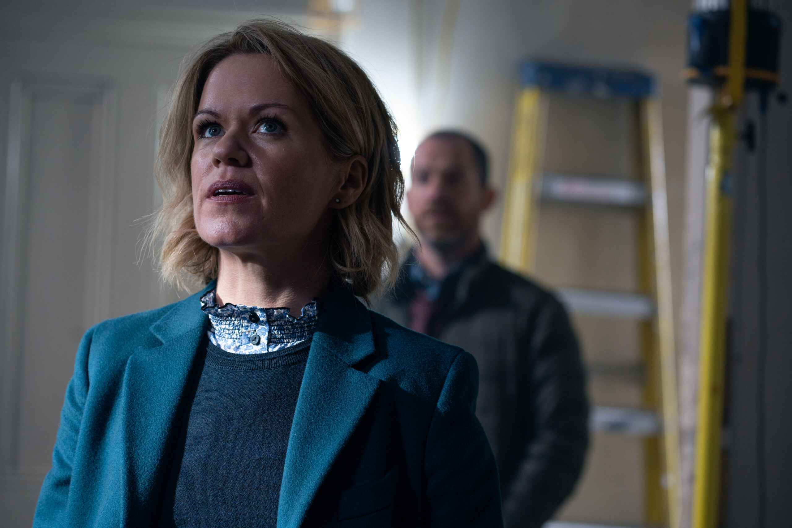 Jess James looks up in the house in Unforgotten