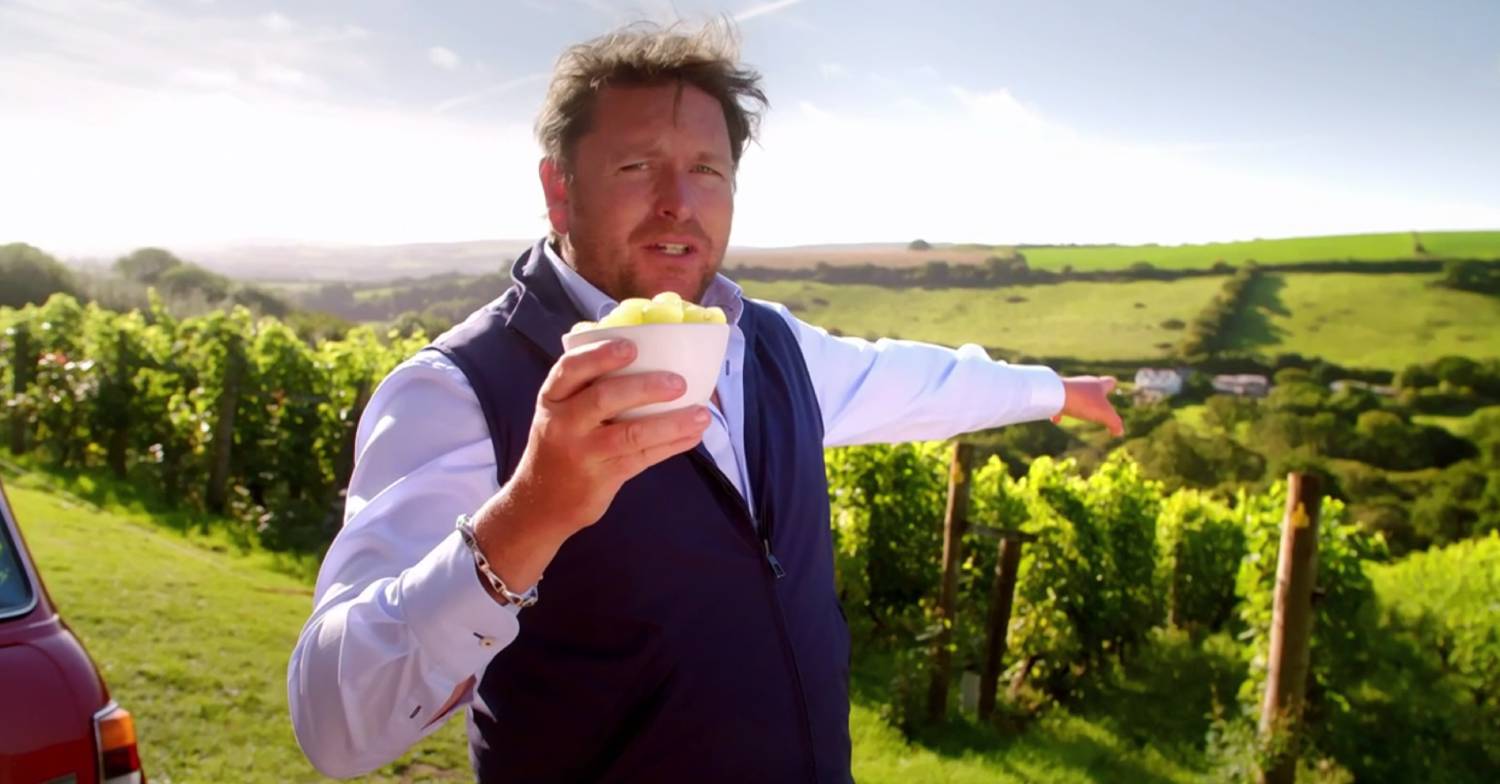 James Martin points while holding up bowl