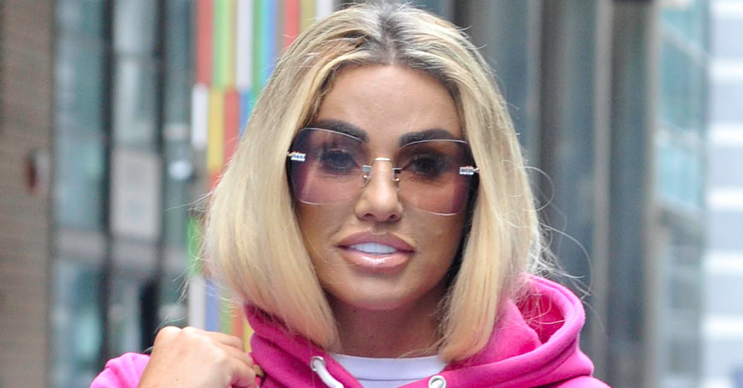 Katie Price looking to camera wearing sunglasses