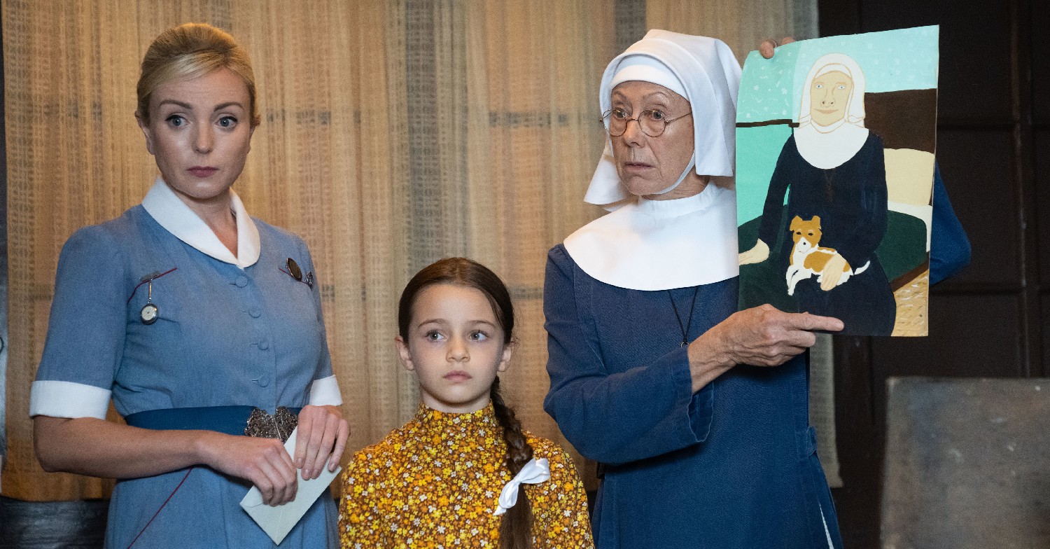 Nurse Trixie, Sister Julienne and Colette Corrigan standing together in Call the Midwife on BBC