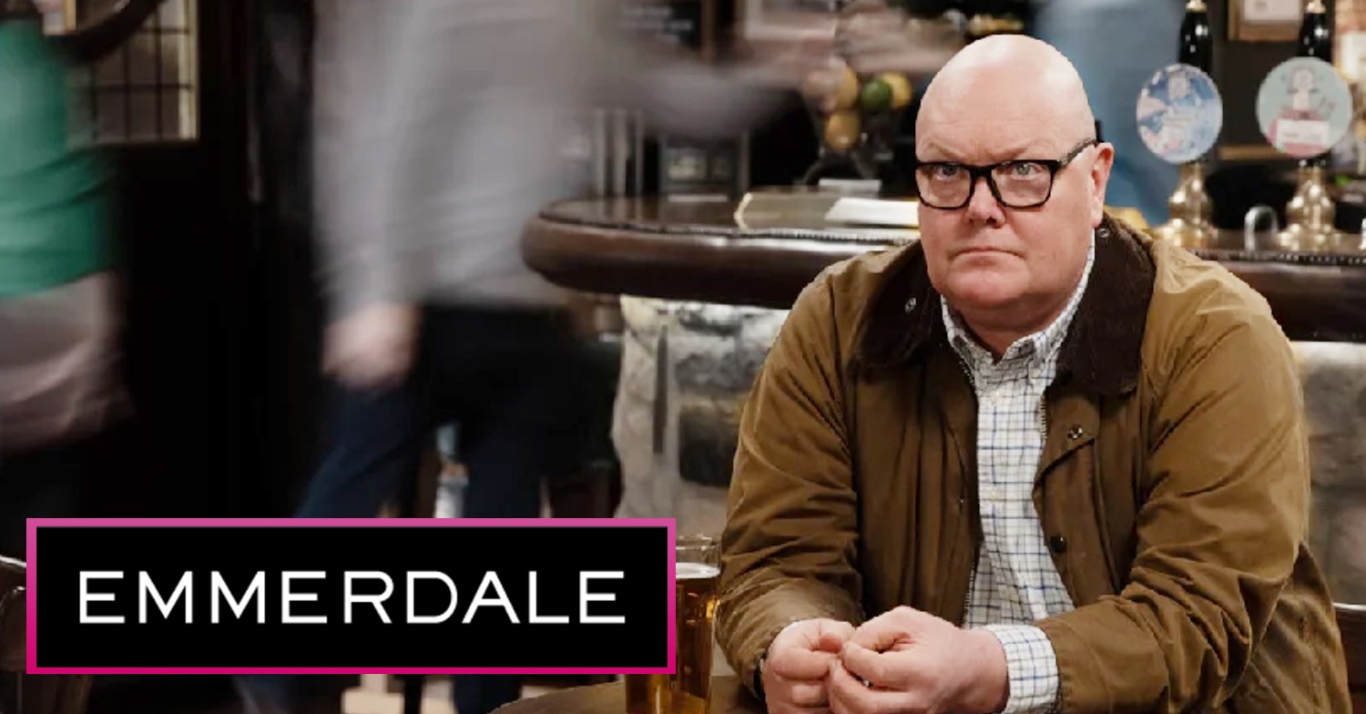 Paddy looking worried in Emmerdale with logo