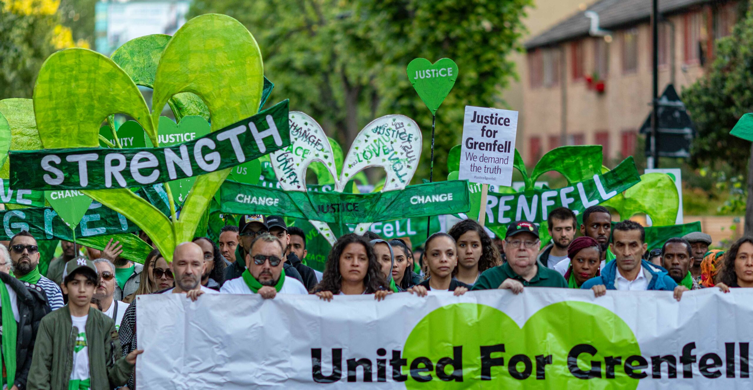 People march to mark the two-year anniversary of the Grenfell Tower block fire