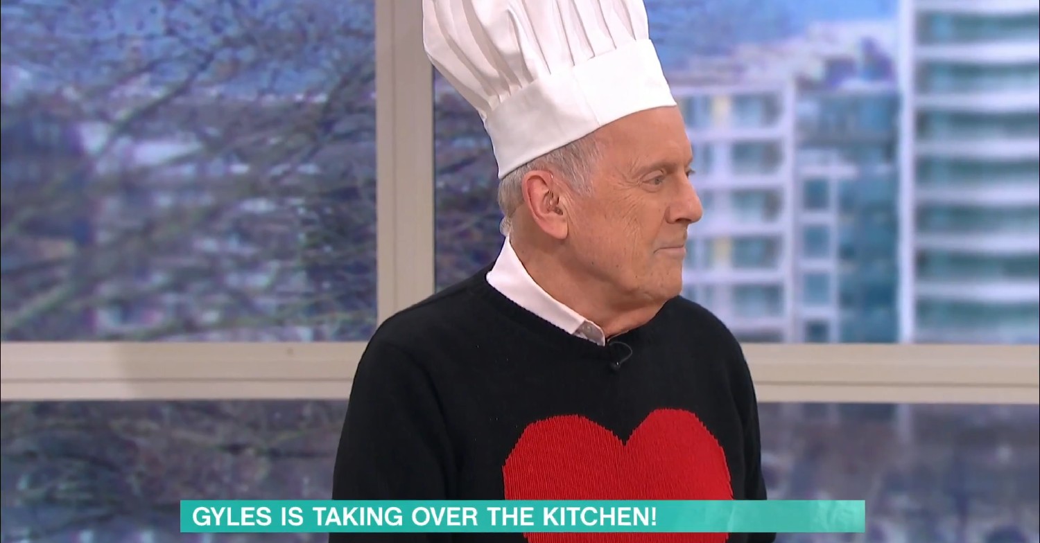 Gyles Brandreth wearing a chef's hat on This Morning today