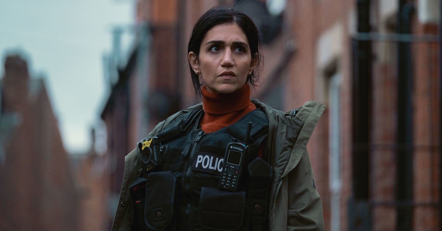 Leila Farzad wearing a police uniform in Better