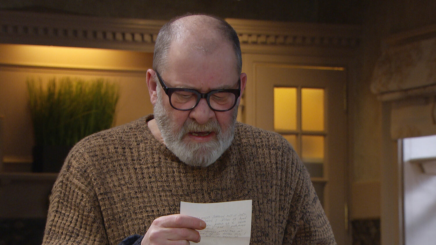 Bear reads Paddy's suicide note, looking scared on Emmerdale