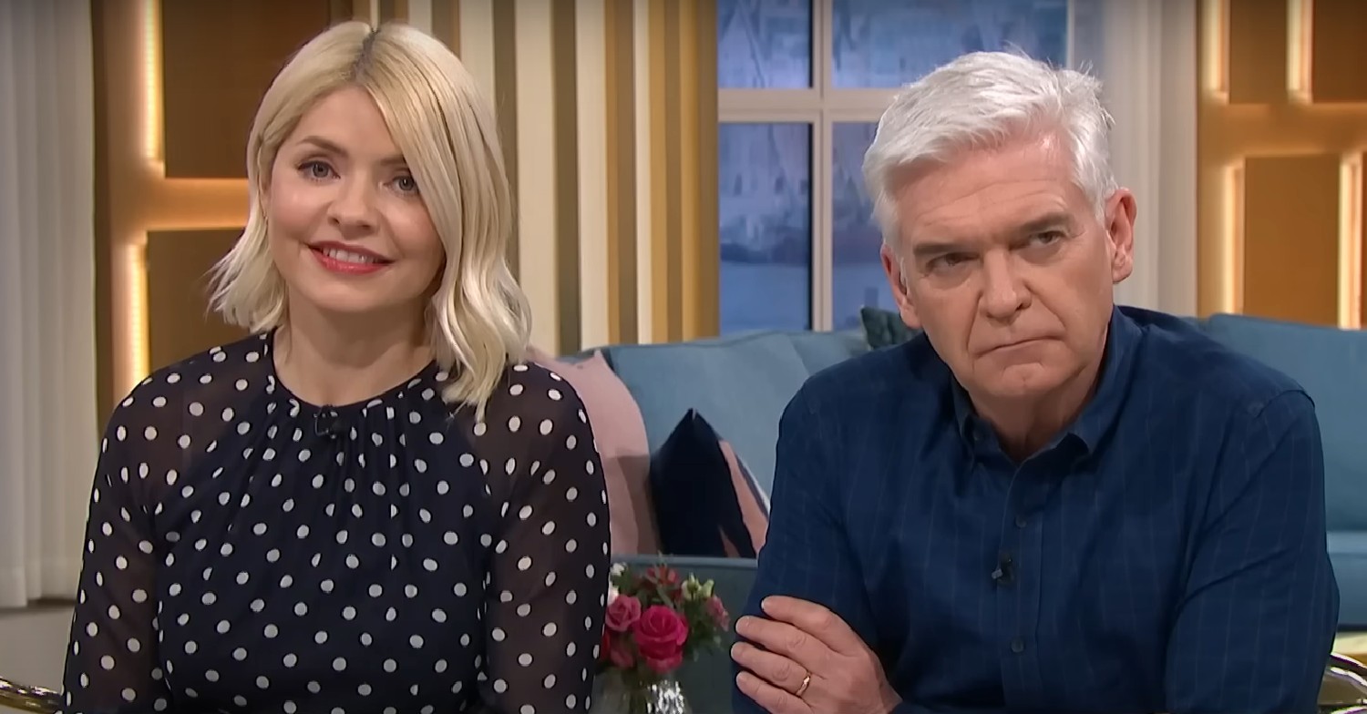 Holly Willoughby smiling and Phillip Schofield looking concerned on This Morning