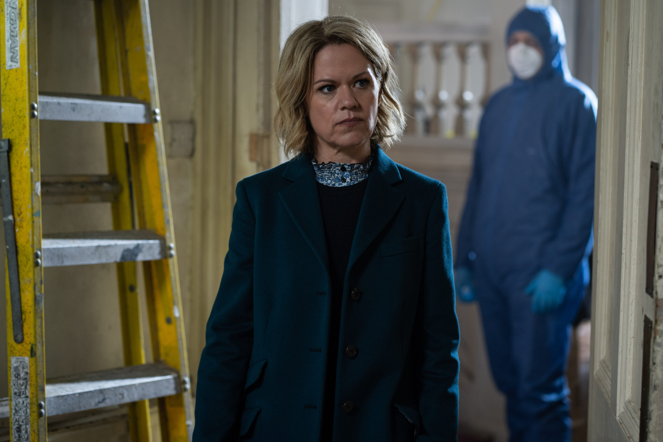 DCI Jess James walks througha crime scene in Unforgotten episode 1