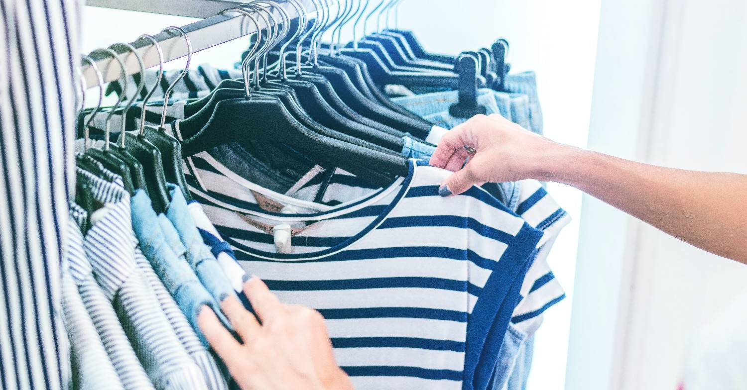 Woman organising her wardrobe