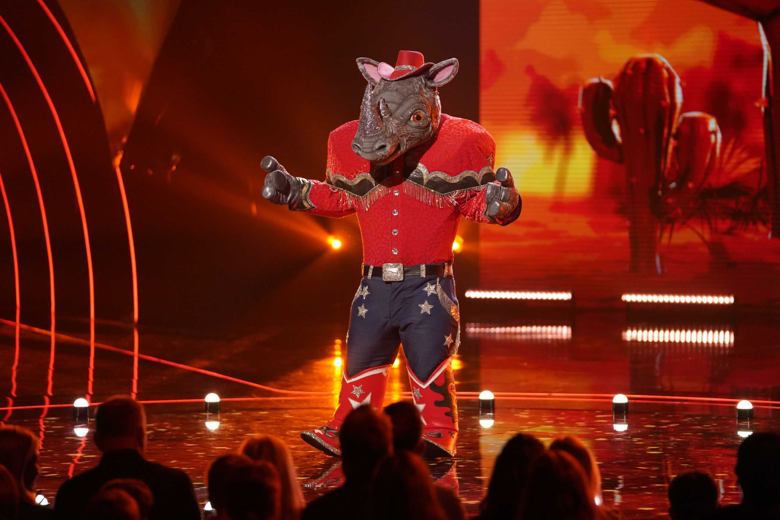 Rhino sings on The Masked Singer 2023