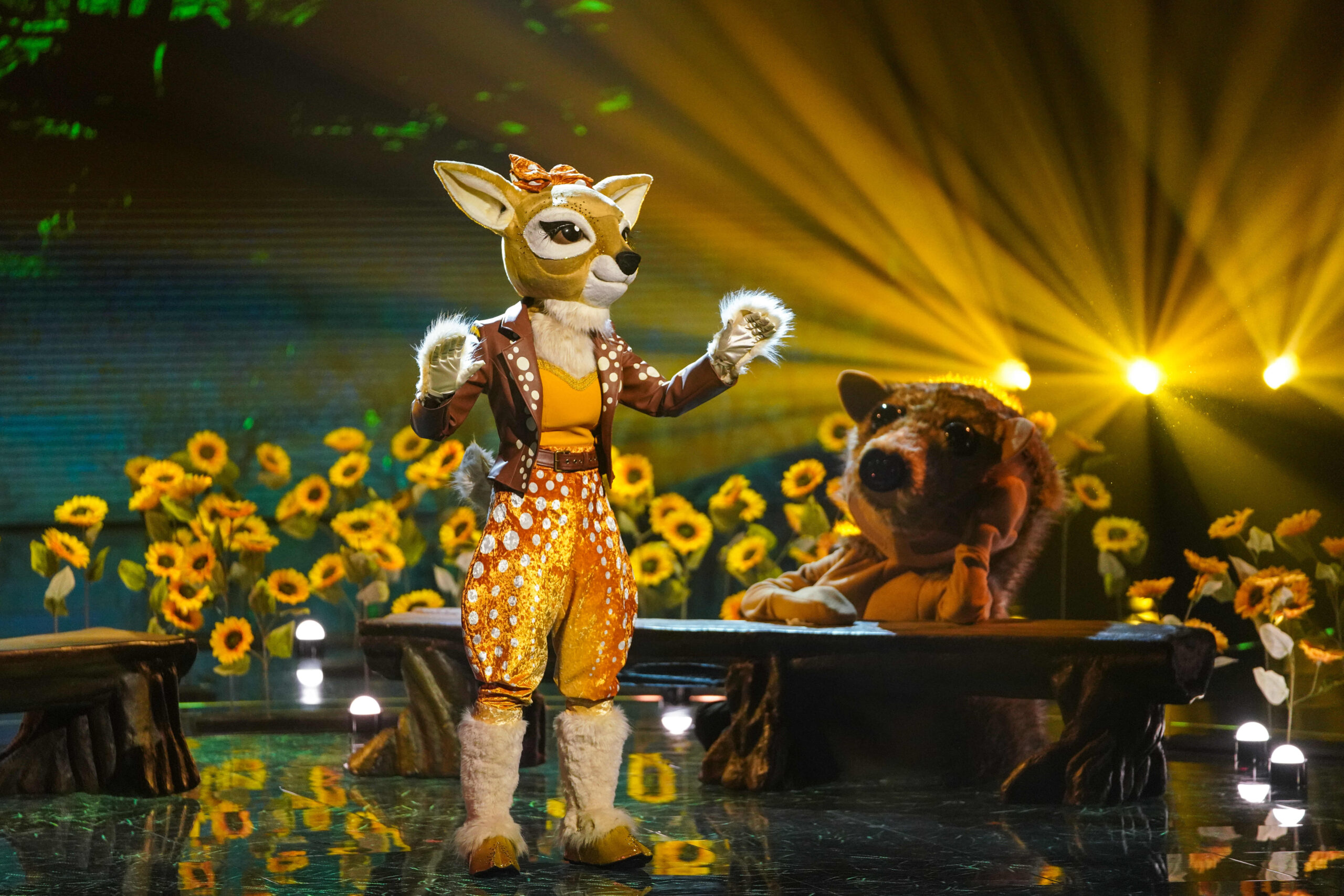 Fawn sings on stage on The Masked Singer 2023