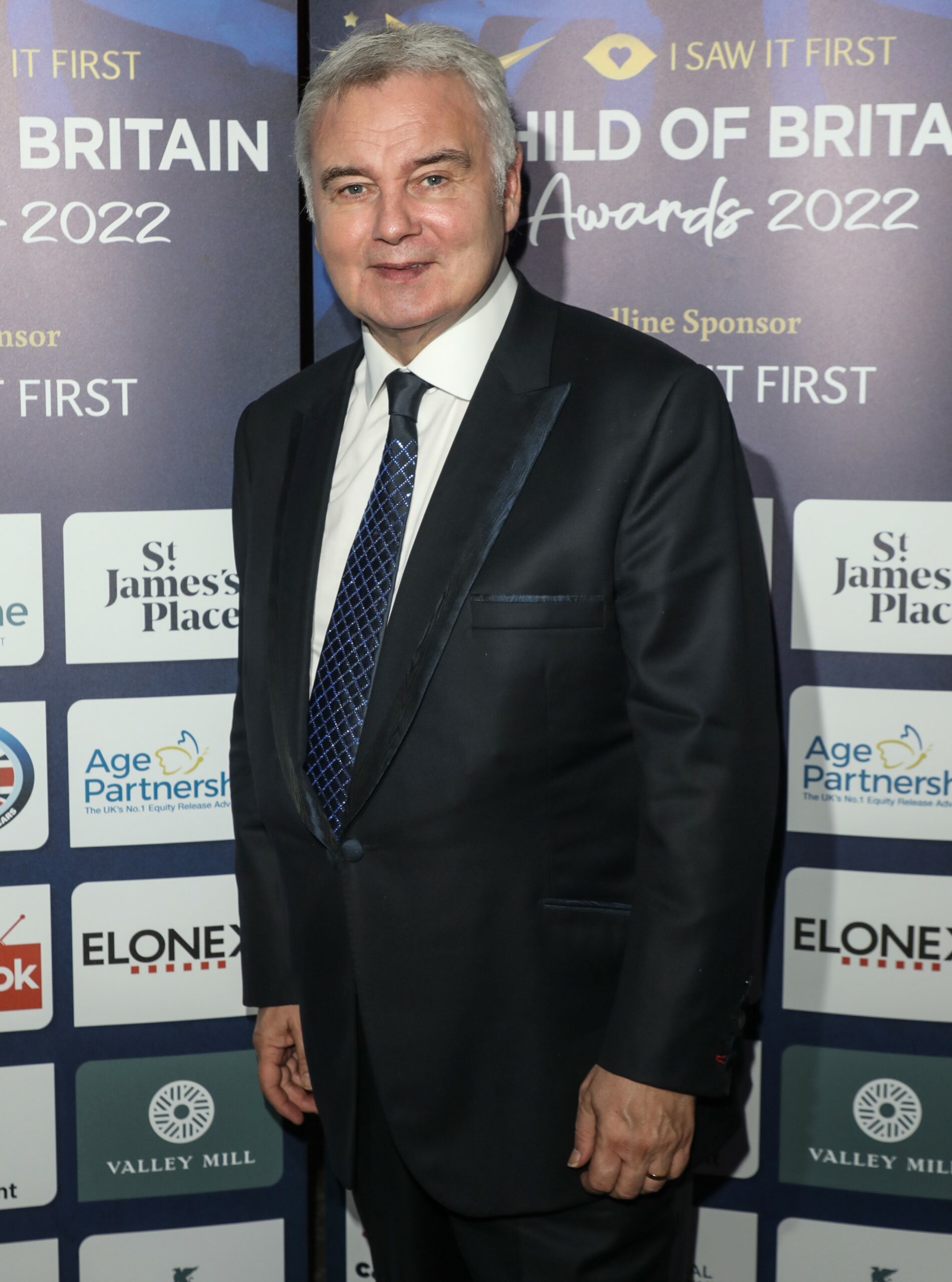 Eamonn Holmes in black suit at awards