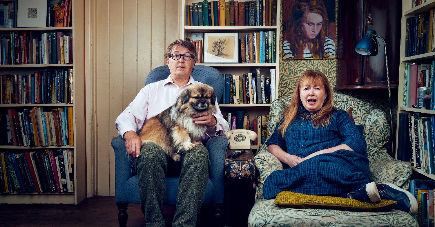Giles and Mary sitting in their arm chairs in Gogglebox