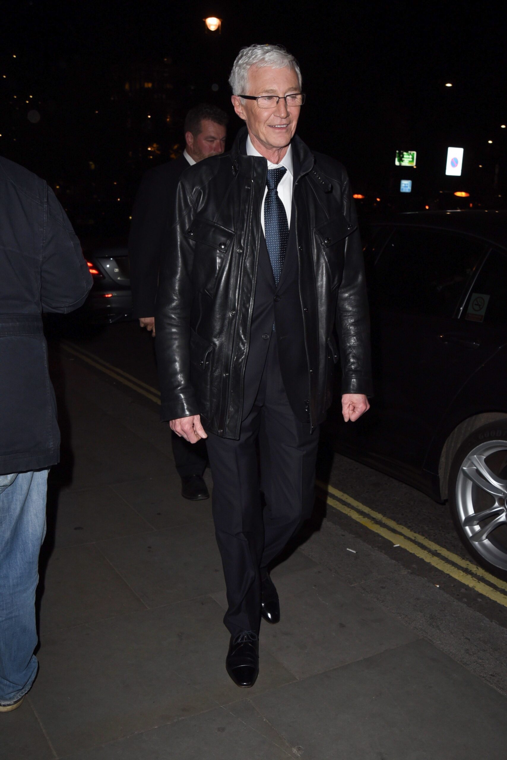 Paul O'Grady wearing a leather jacket