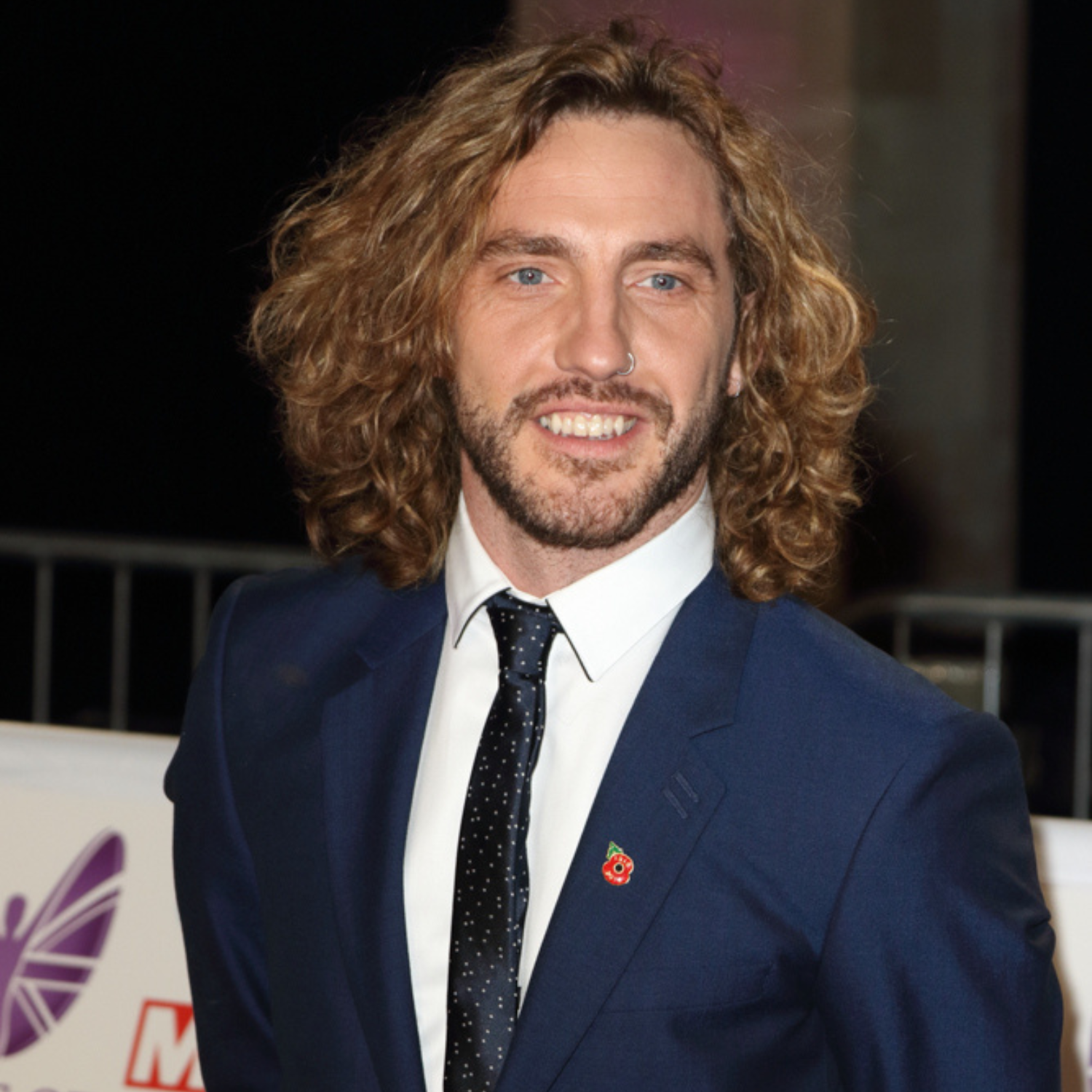 Seann poses for photos