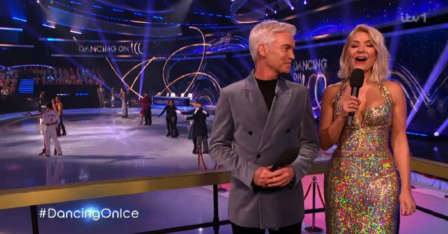 Phillip Schofield looks at Holly Willoughby in sequinned dress on Dancing On Ice