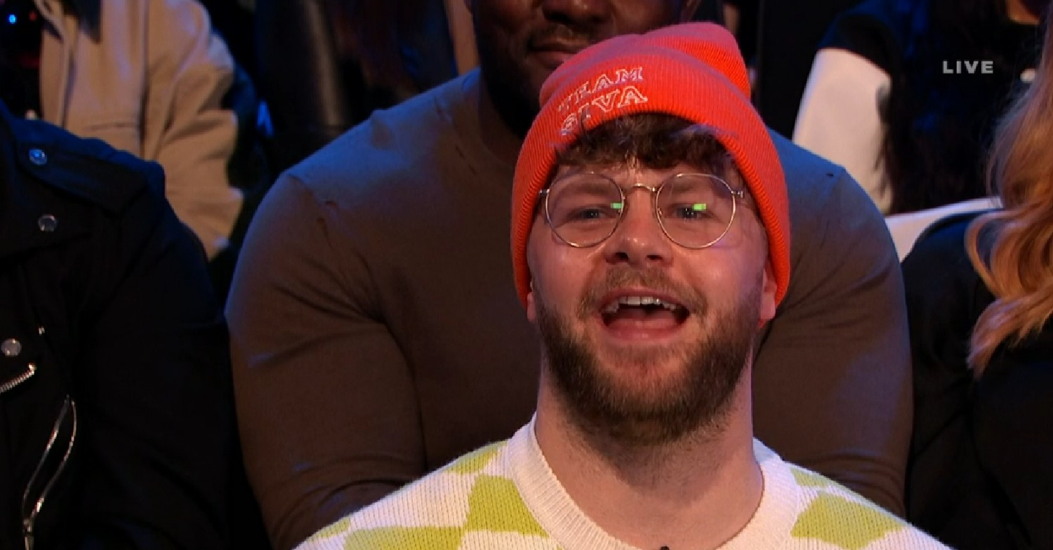 Jay McGuiness in orange beanie on Dancing On Ice last night