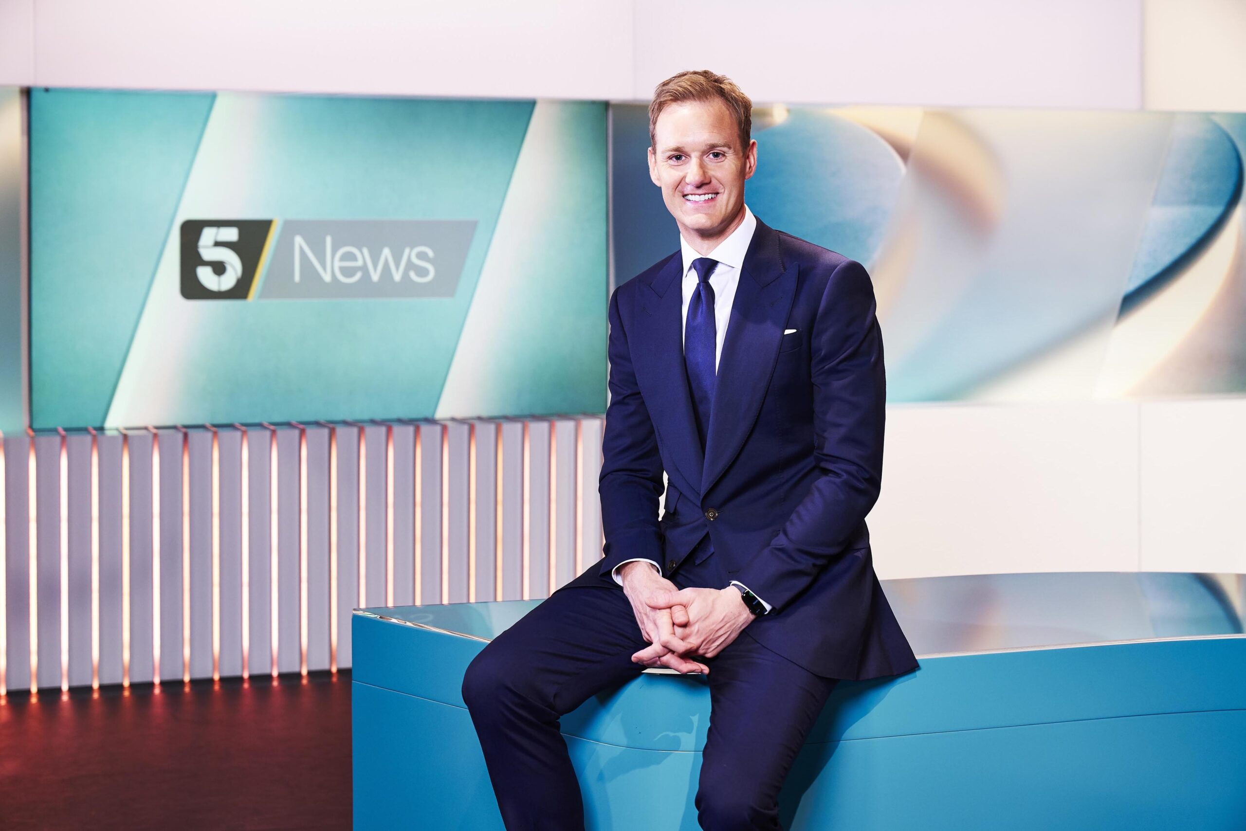 Dan Walker poses on Channel 5 News set