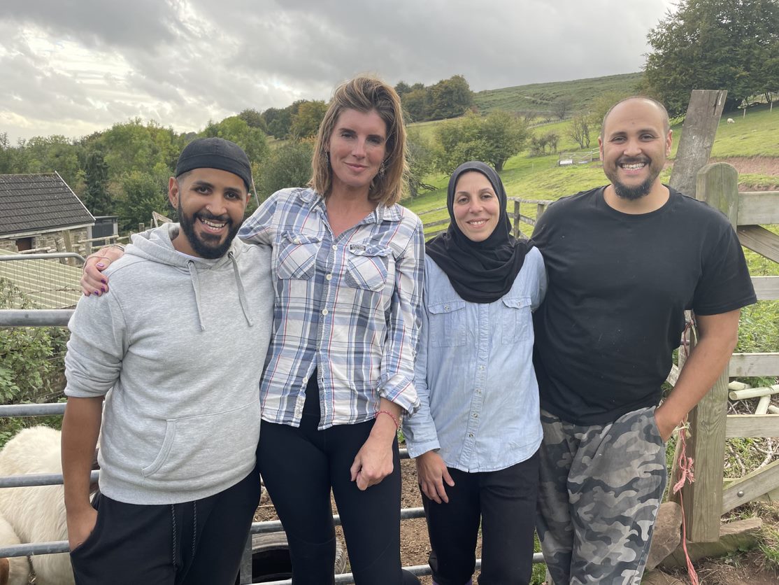 Amanda Owen standing with the Hassanin family in Farming Lives