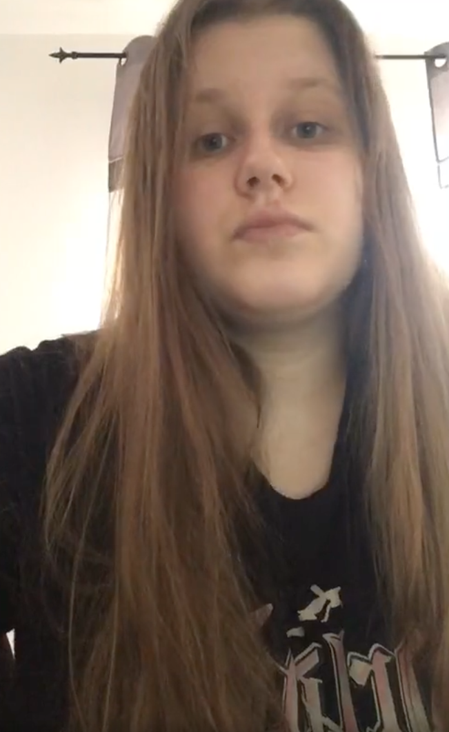 Girl who thinks she's Madeleine McCann looking sad