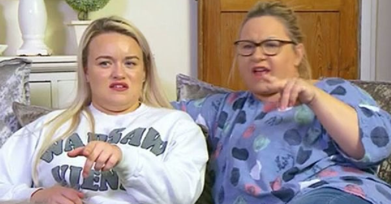 Gogglebox stars Paige and Sally pointing at the TV 