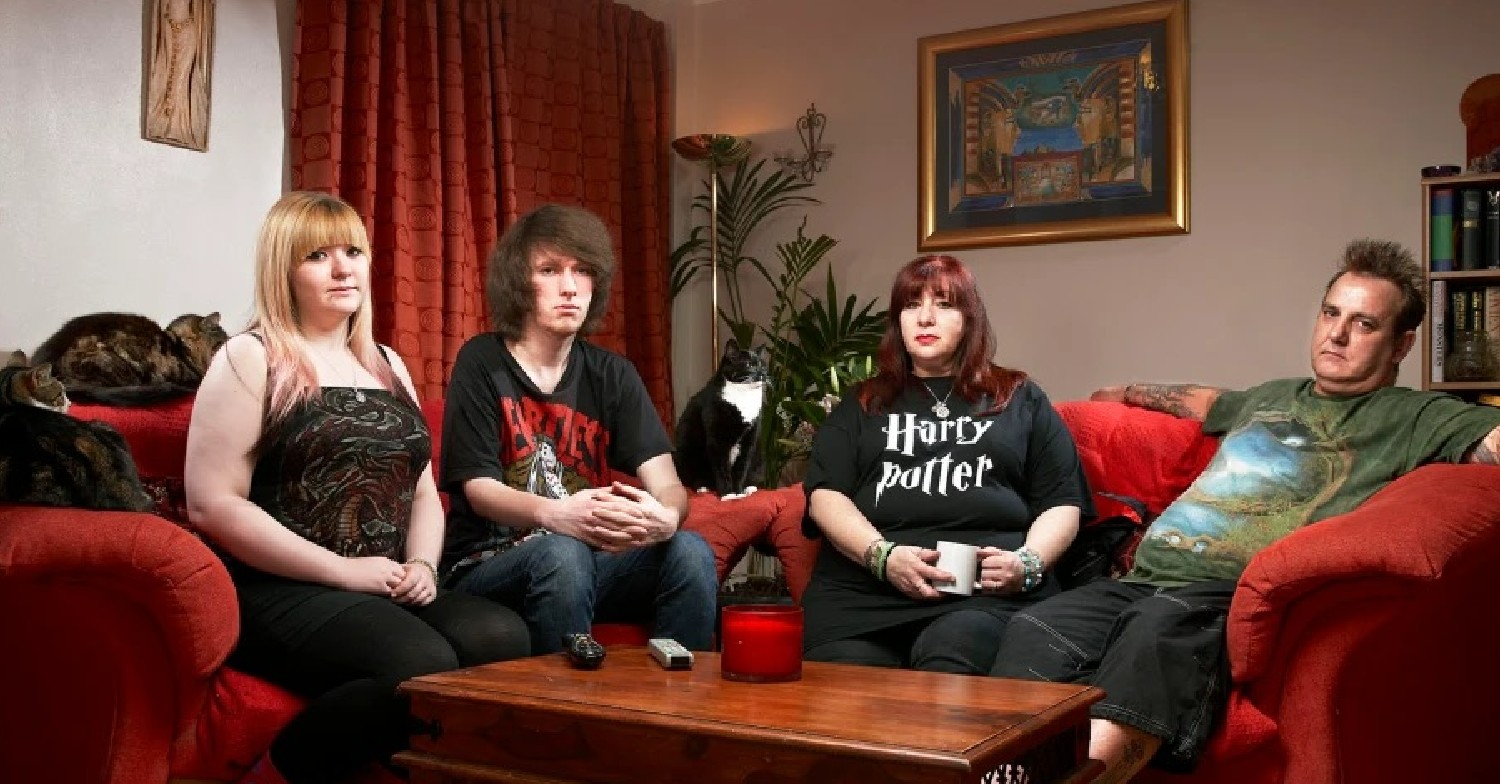 The Woerdenwebers sitting in their living room