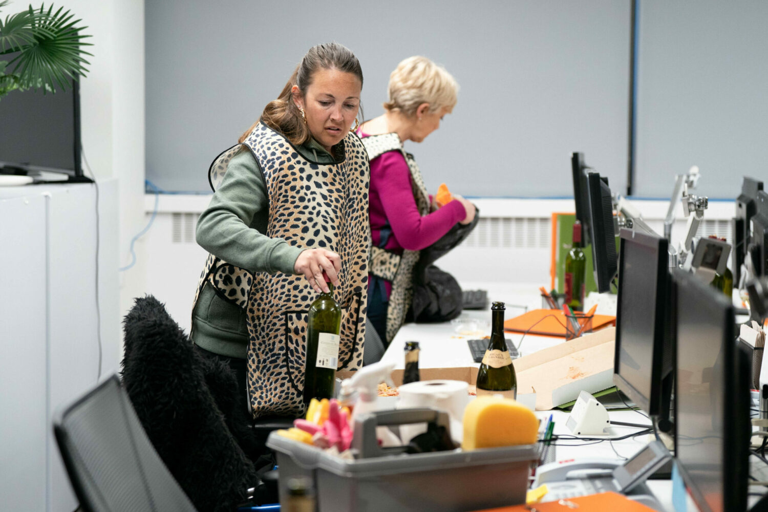 Stacey cleaning an office with Jean on EastEnders