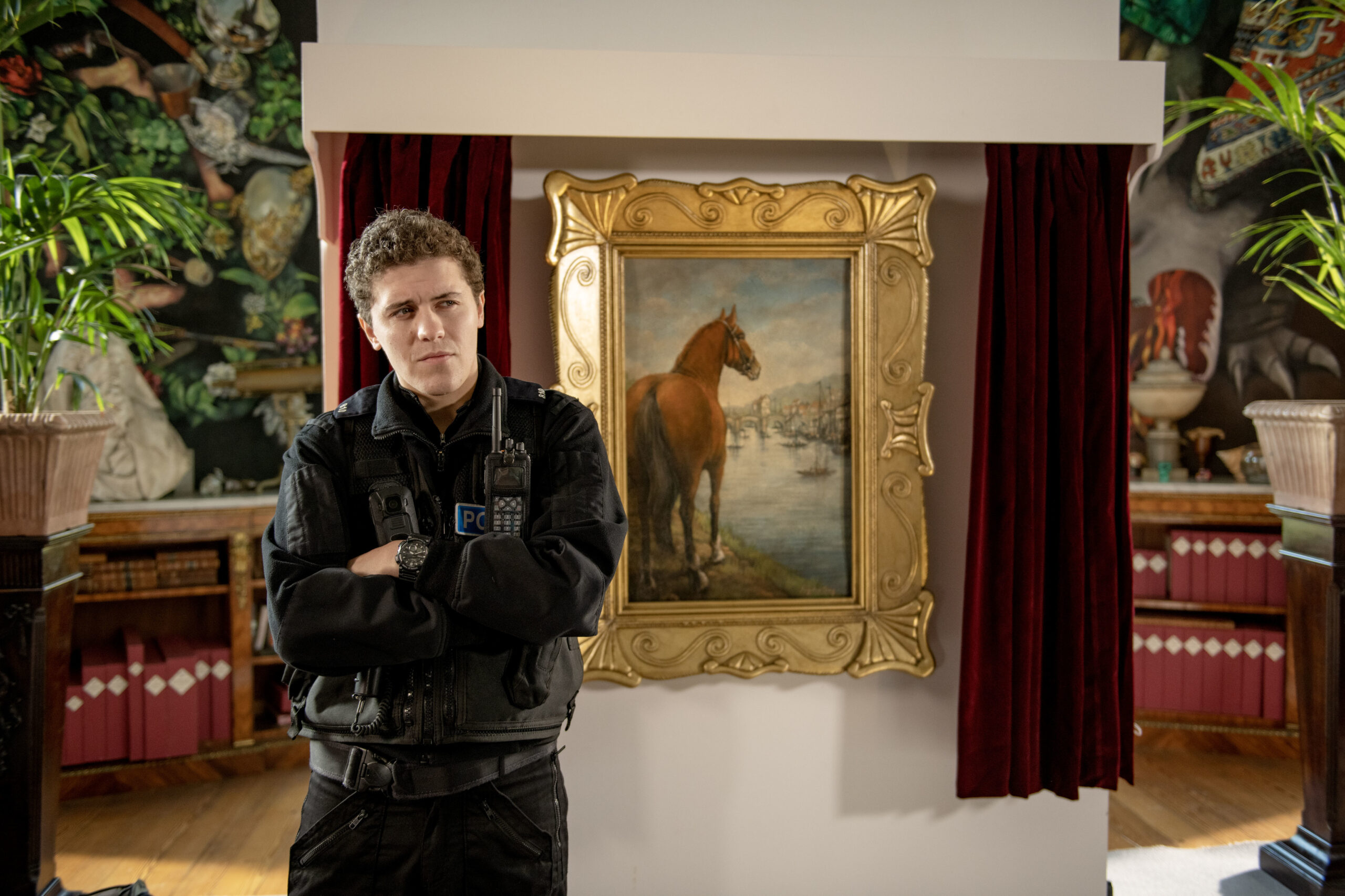 Dylan Llewellyn portrays DC Kelby Hartford in Beyond Paradise