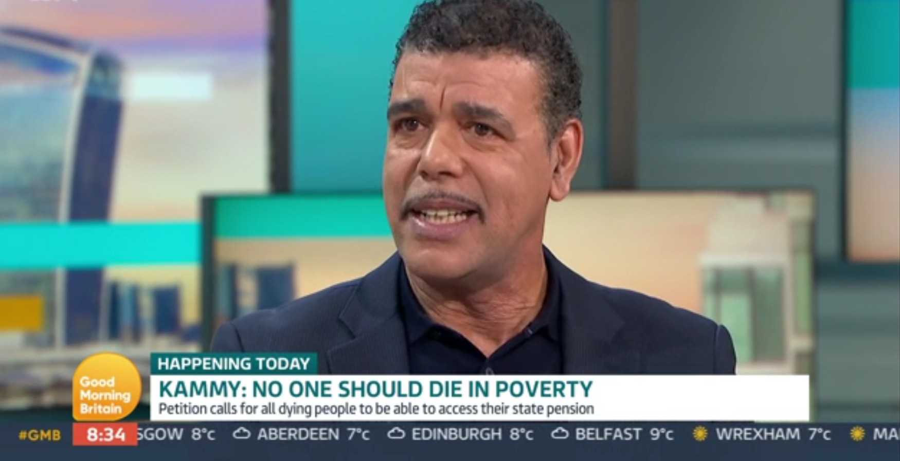 Chris Kamara smiles on Good Morning Britain