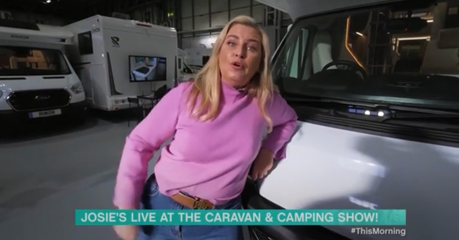 Josie Gibson posing in front of a campervan on This Morning 