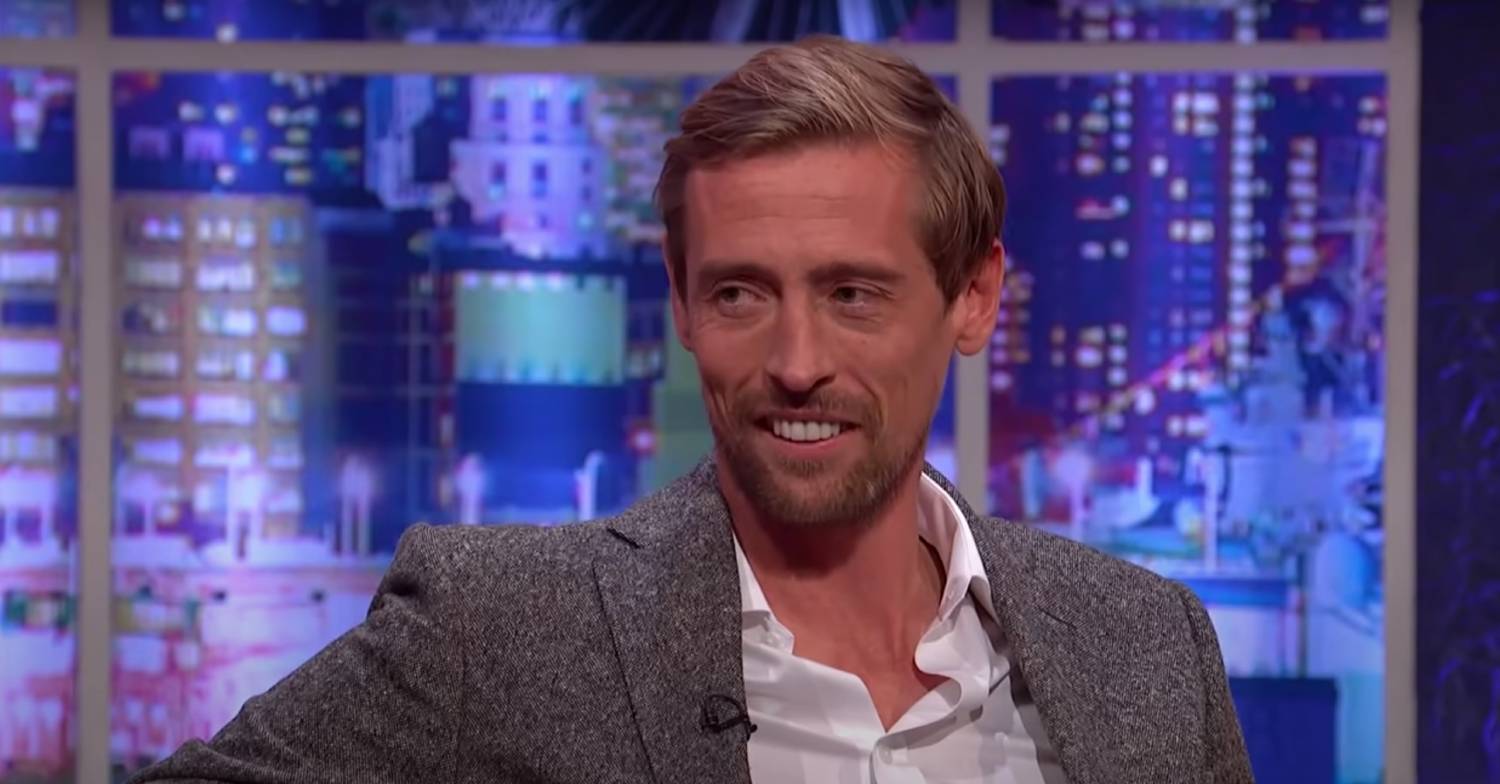 Peter Crouch smiles during interview appearance