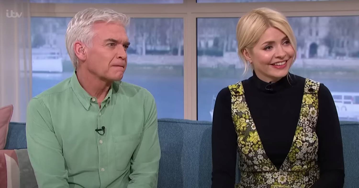 Phillip Schofield listens alongside Holly Willoughby