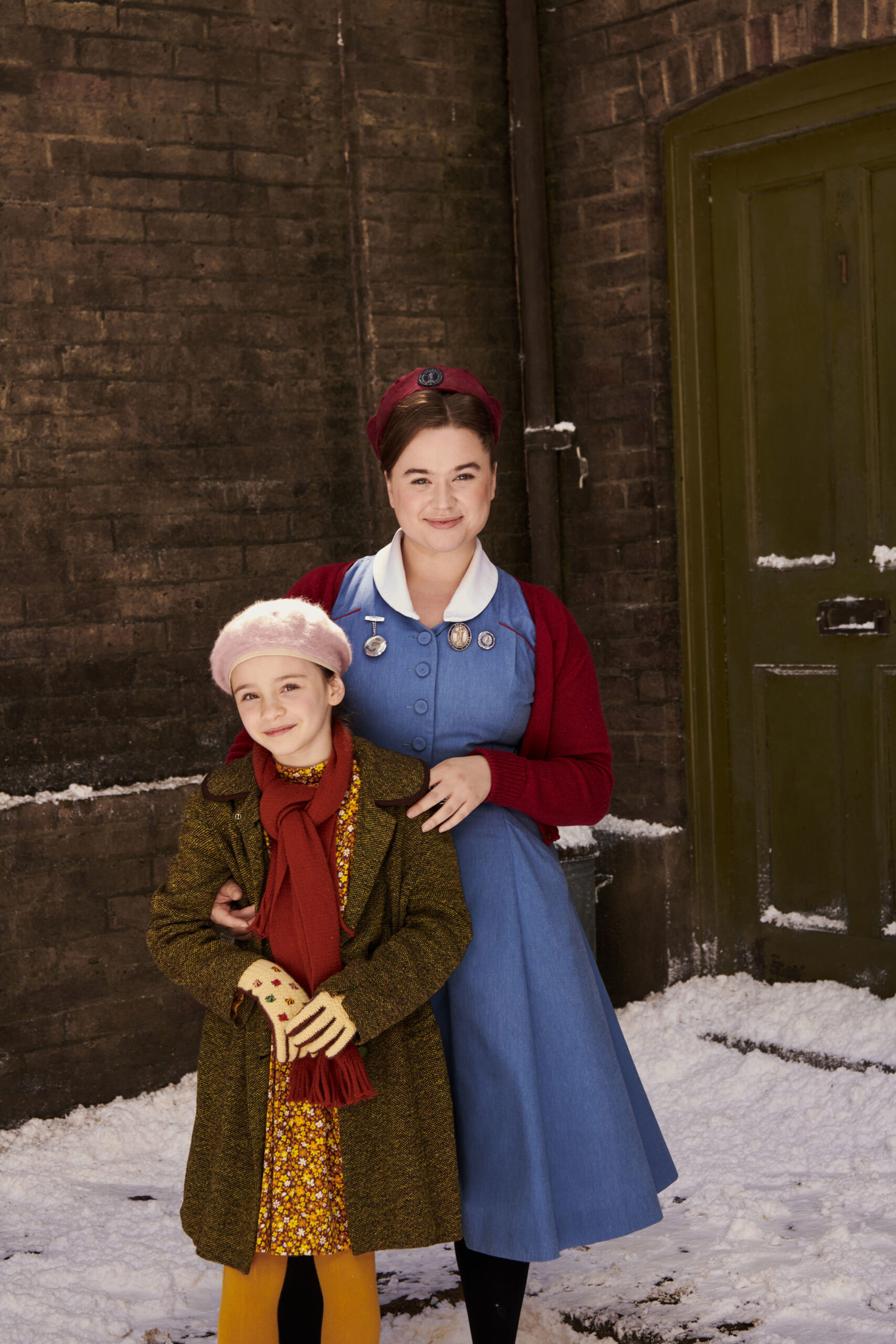 Nancy smiles with her daughter Cosette