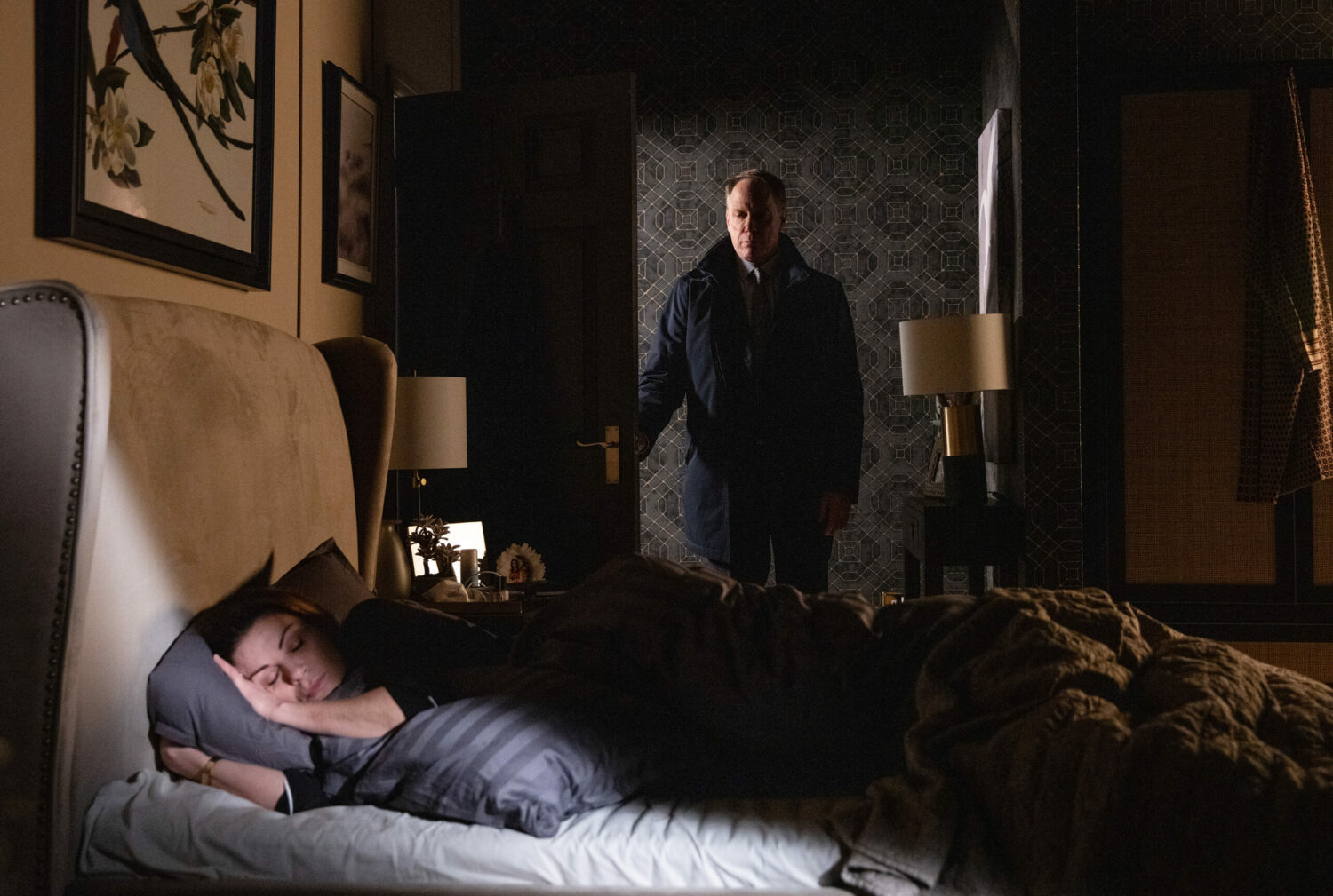 Stephen Reid watches over Carla Connor as she sleeps