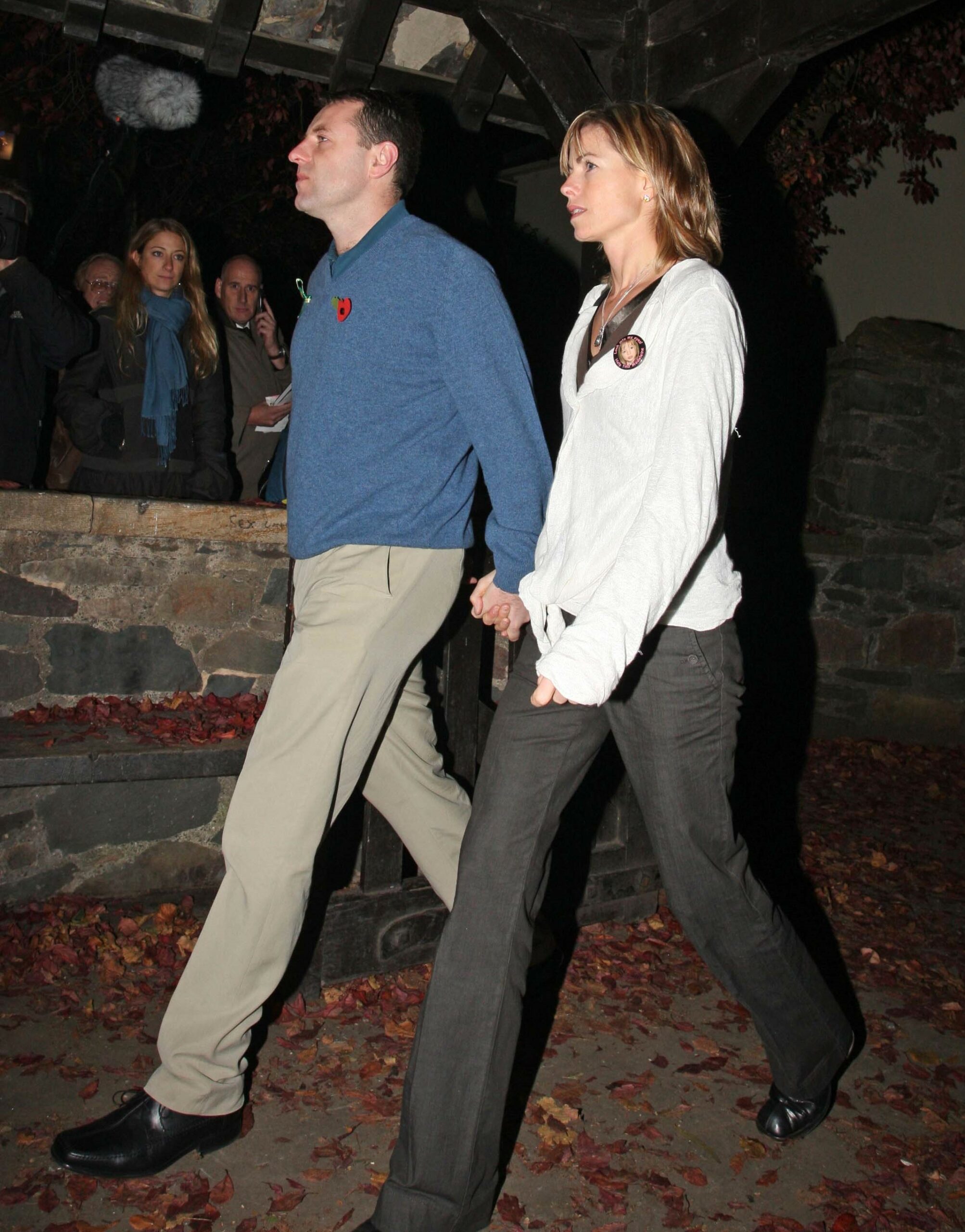 Gerry and Kate McCann walking during Madeleine McCann memorial