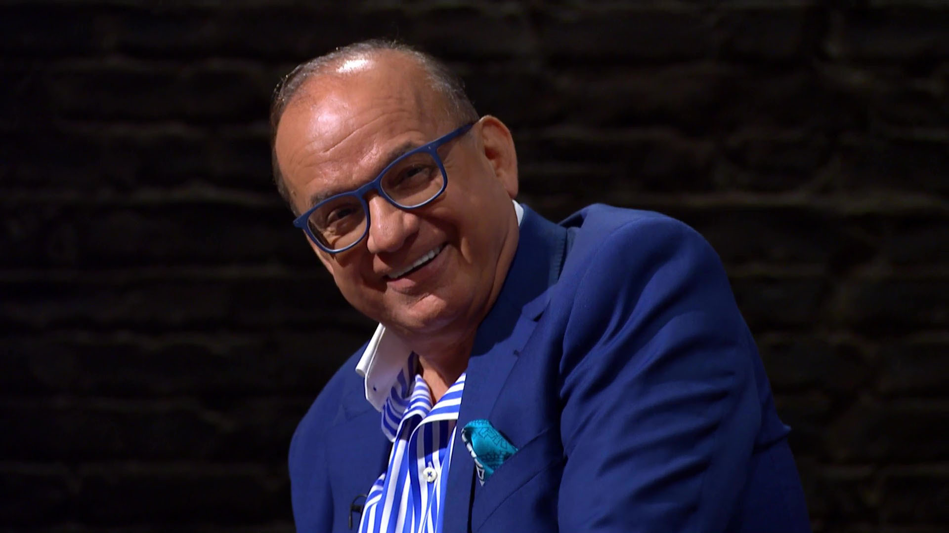 Touker Suleyman smiling on Dragons' Den