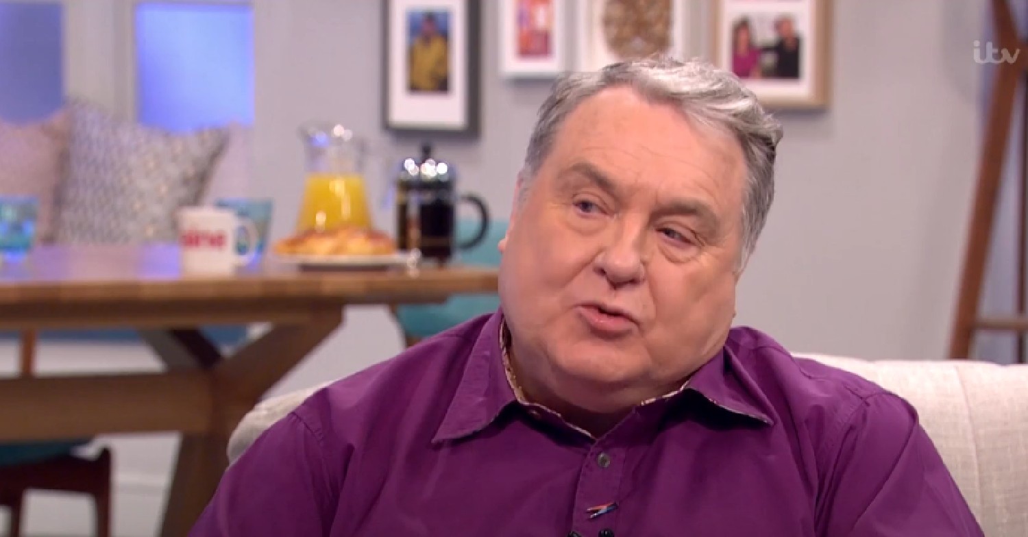 Russell Grant speaking in purple shirt on Lorraine