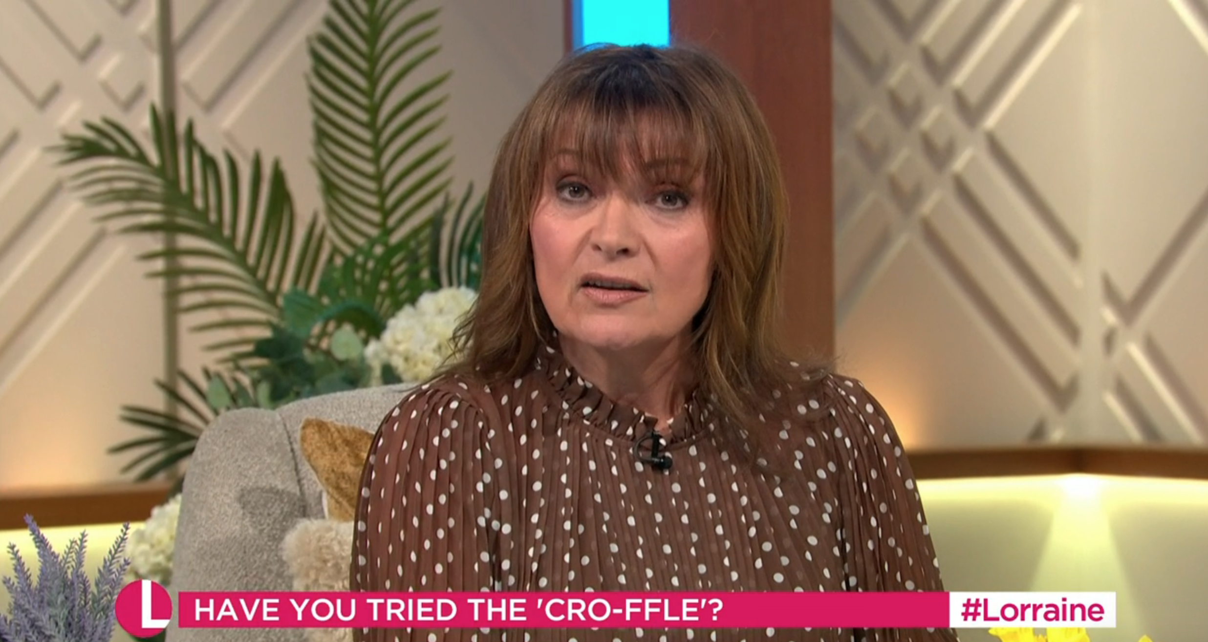 Loraine Kelly wearing brown on her breakfast TV show