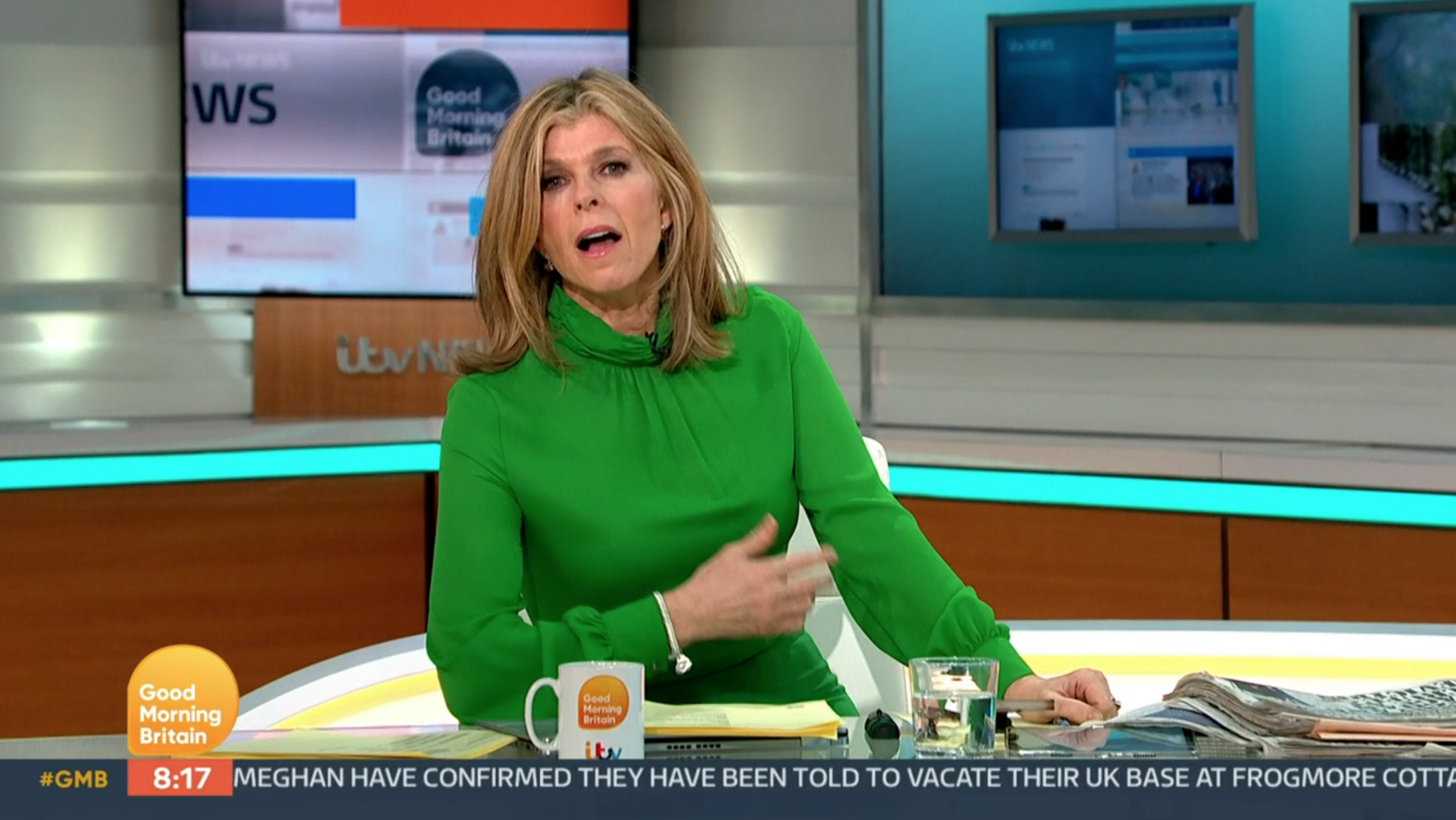 Kate Garraway presenting GMB in a green jumpsuit