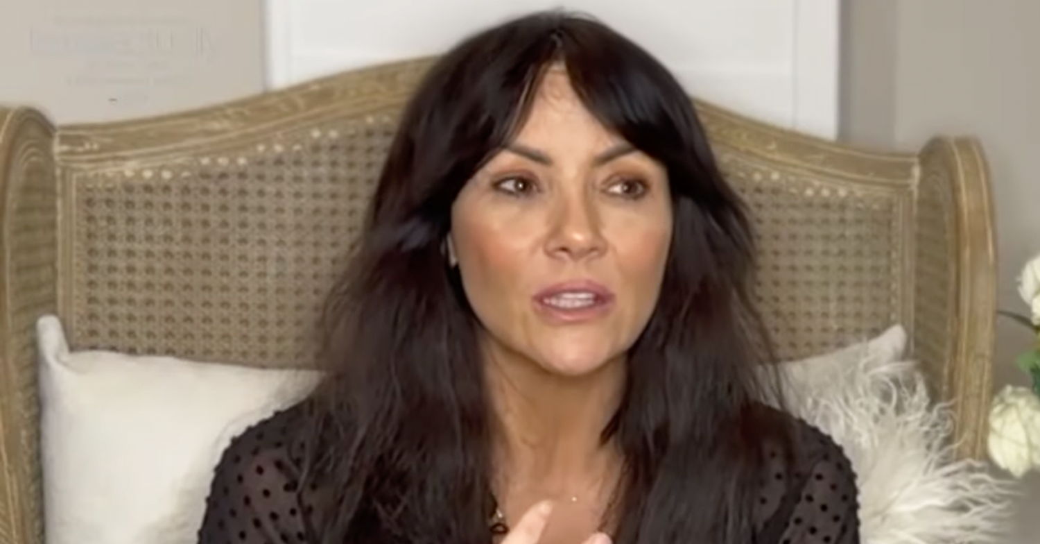 Martine McCutcheon with her hair down being interviewed