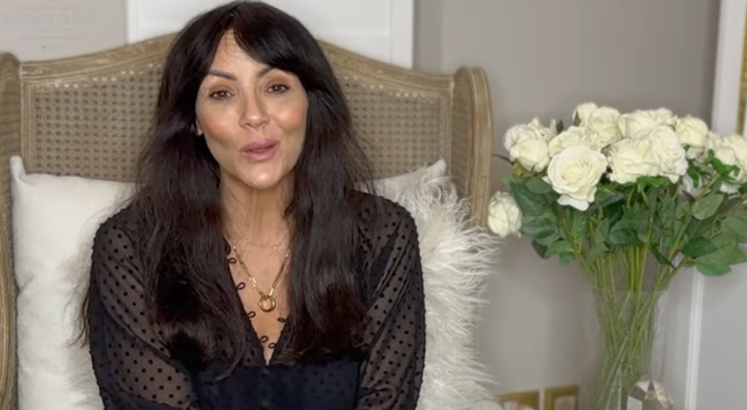 Martine McCutcheon with her hair down being interviewed