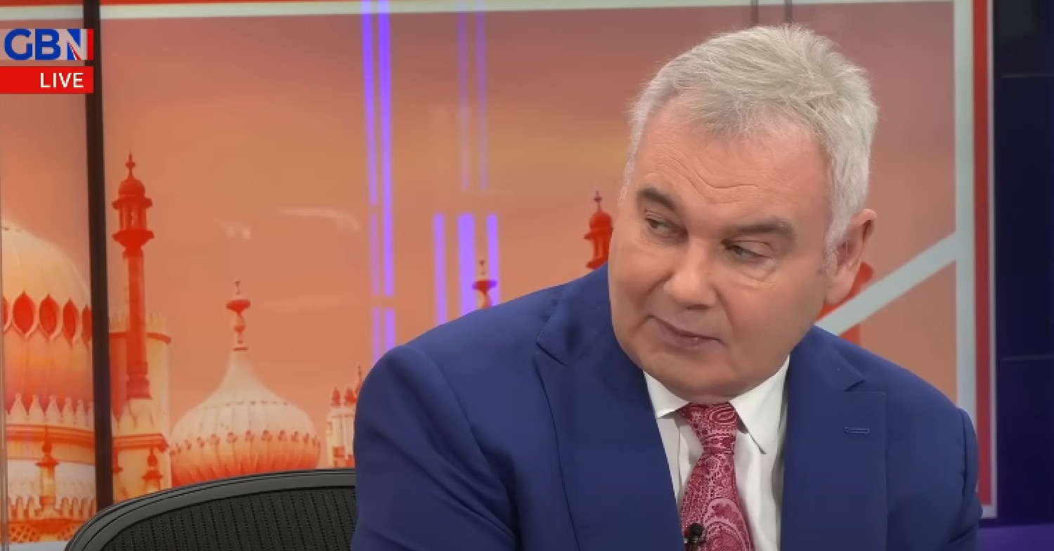 Eamonn Holmes looking to the side on GB News